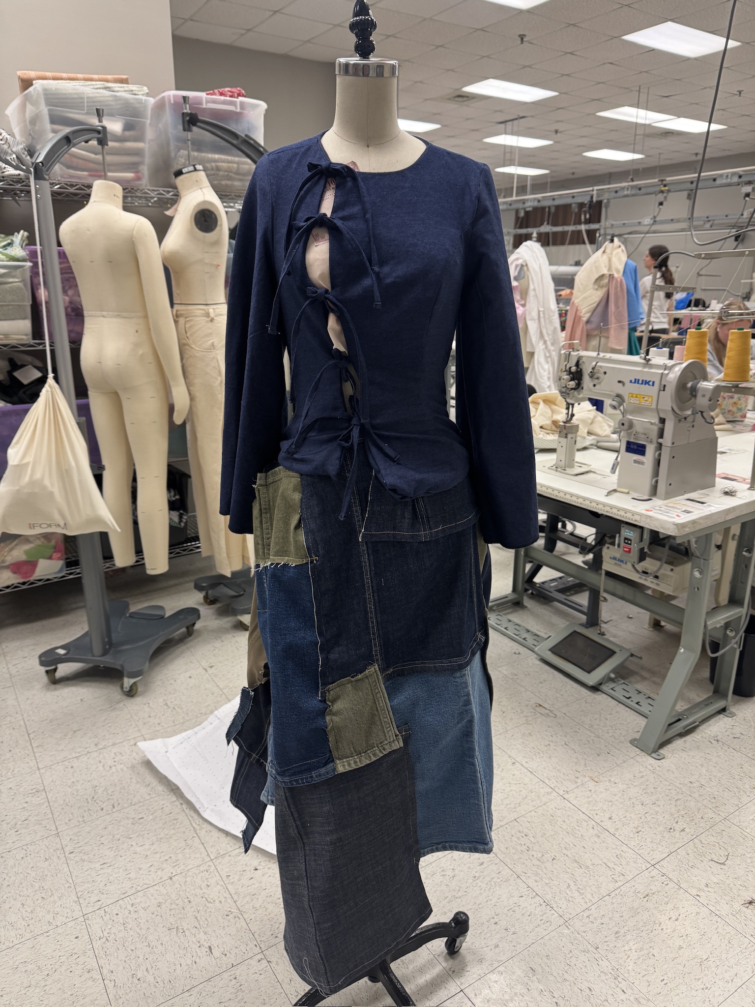Model wearing final Astra look in library